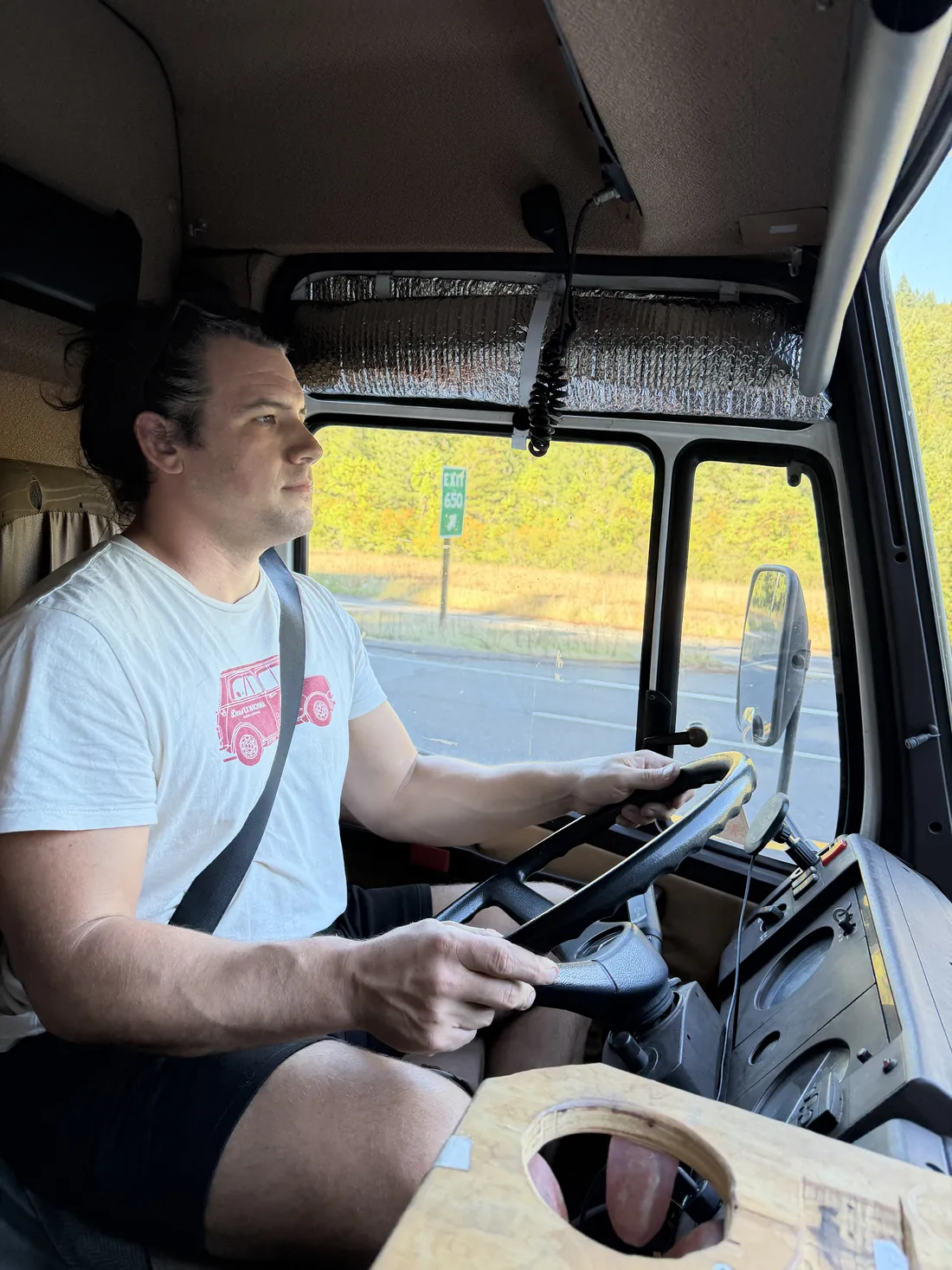 Behind the wheel of the 609D, rolling down the highway